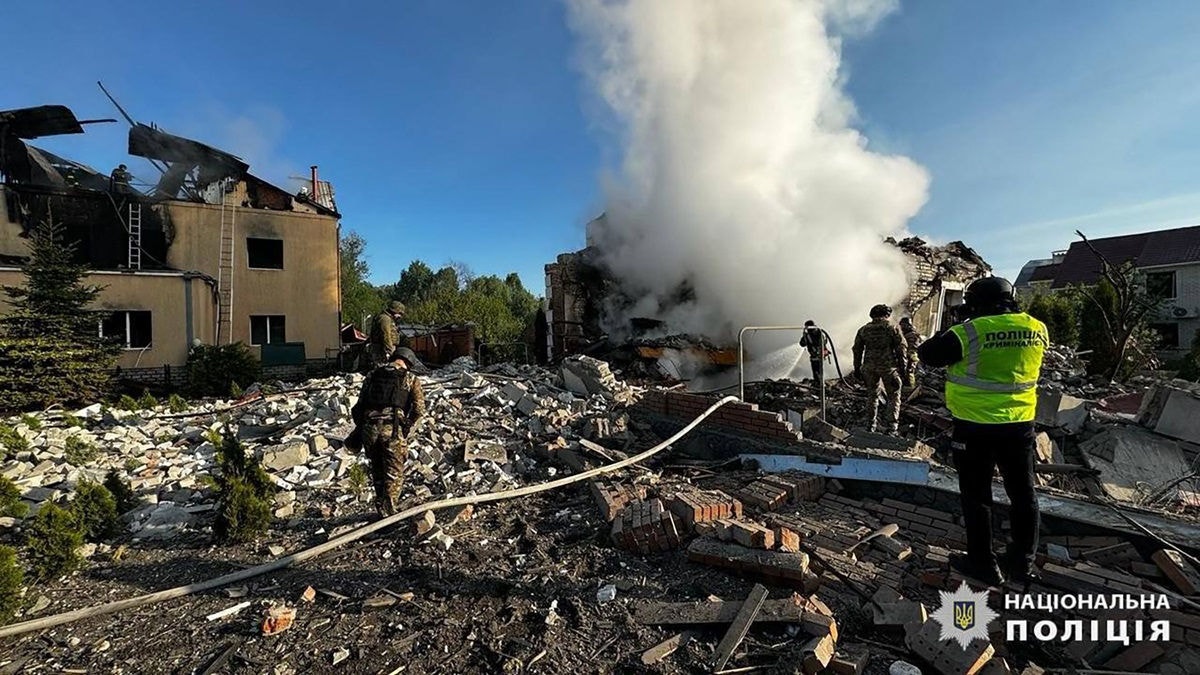 This handout photograph taken and released by the National Police of Ukraine on May 10, 2024, shows employees of the State Emergency Service extinguishing fires of private houses destroyed by a shelling in Kharkiv, eastern Ukraine, amid the Russian invasion in Ukraine. (Photo by Handout / National Police of Ukraine / AFP) / RESTRICTED TO EDITORIAL USE - MANDATORY CREDIT "AFP PHOTO / National Police of Ukraine" - NO MARKETING NO ADVERTISING CAMPAIGNS - DISTRIBUTED AS A SERVICE TO CLIENTS