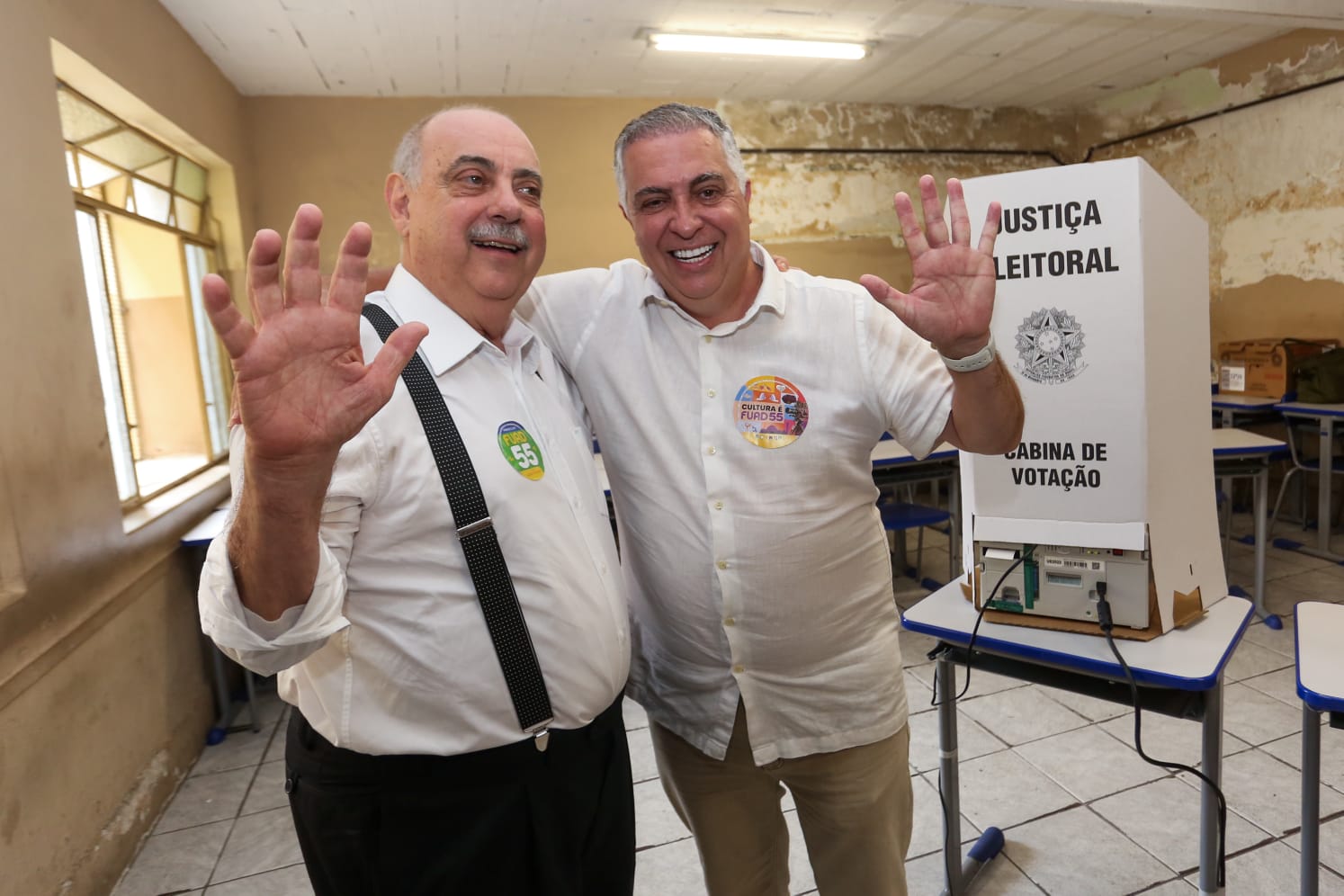 Fuad Noman e Álvaro Damião durante votação nas eleições do ano passado. 
