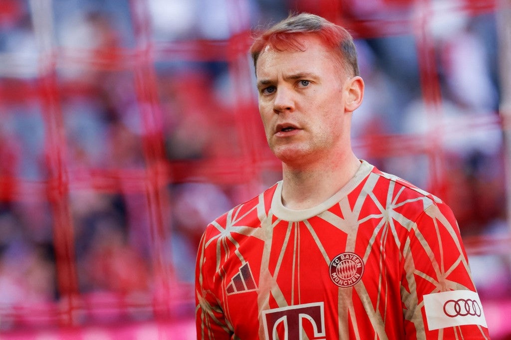 Bayern Munich's German goalkeeper #01 Manuel Neuer warms up prior to the German first division Bundesliga football match between FC Bayern Munich and VfL Wolfsburg in Munich, southern Germany on May 12, 2024. (Photo by Michaela STACHE / AFP) / DFL REGULATIONS PROHIBIT ANY USE OF PHOTOGRAPHS AS IMAGE SEQUENCES AND/OR QUASI-VIDEO