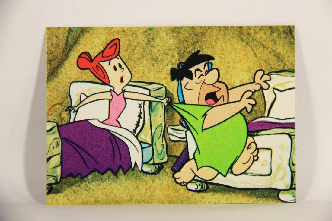 Cena mostra o casal Fred e Wilma, do desenho animado Os Flintstones, dormindo em camas separadas