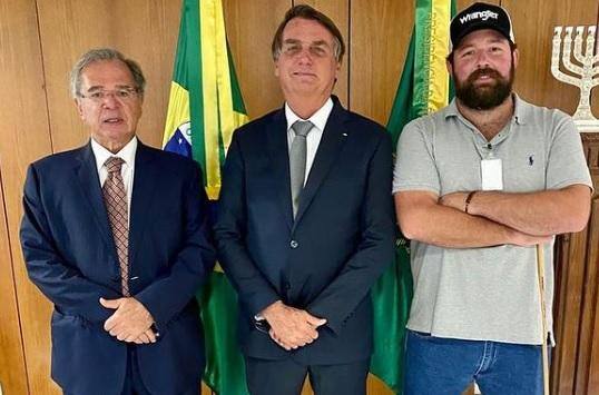 Sandro Fusca ao lado de Jair Bolsonaro e Paulo Guedes no Palácio do Planalto