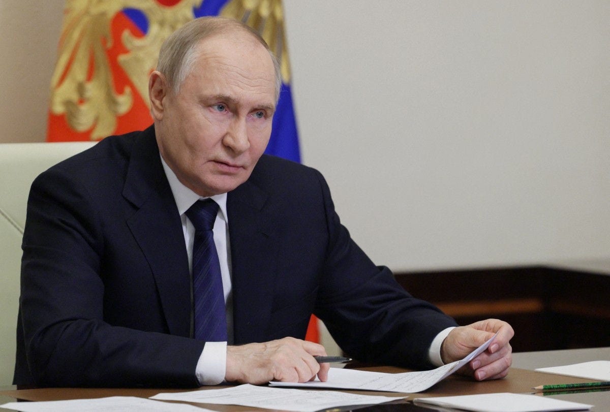 In this pool photograph distributed by the Russian state agency Sputnik, Russia's President Vladimir Putin chairs a meeting on educational and museum complexes via a videoconference at the Novo-Ogaryovo state residence outside Moscow on June 25, 2025. (Photo by Gavriil Grigorov / POOL / AFP)