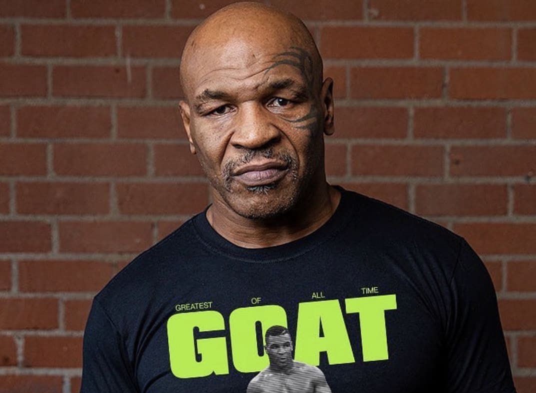 Ex-boxeador-Mike-Tyson Ex-boxeador Mike Tyson foi copiado por uma magistrada em BH, que mordeu a orelha de uma funcionária