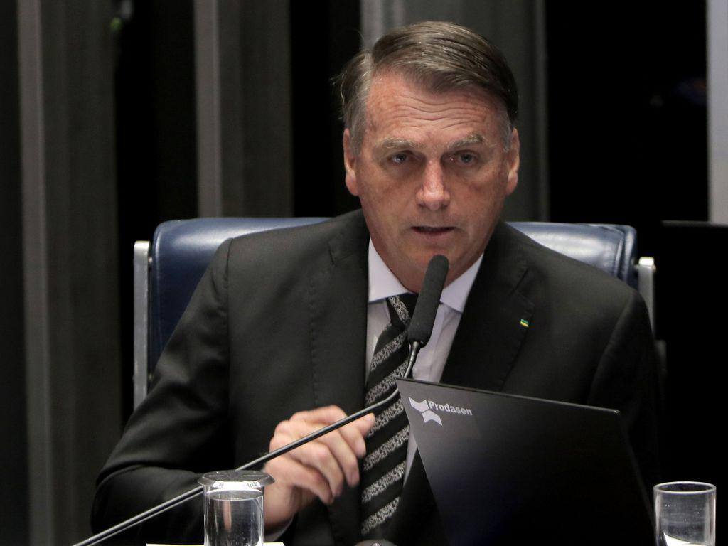 O presidente Bolsonaro em sessão que promulgou emenda à Constituição, que proporciona a ampliação do pagamento de benefícios sociais