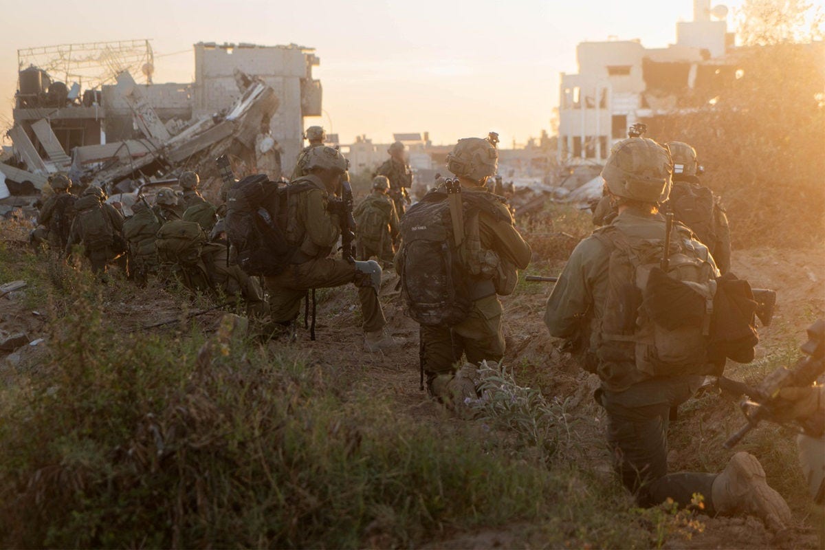 This handout picture released by the Israeli army on May 10, 2024 reportedly shows Israeli soldiers taking a position as part of the activity of the 99th Division in the Zaytoun Area of Gaza City amid the ongoing conflict in the Palestinian territory between Israel and Hamas. (Photo by Israeli Army / AFP) / === RESTRICTED TO EDITORIAL USE - MANDATORY CREDIT "AFP PHOTO / Handout / Israeli Army' - NO MARKETING NO ADVERTISING CAMPAIGNS - DISTRIBUTED AS A SERVICE TO CLIENTS ==