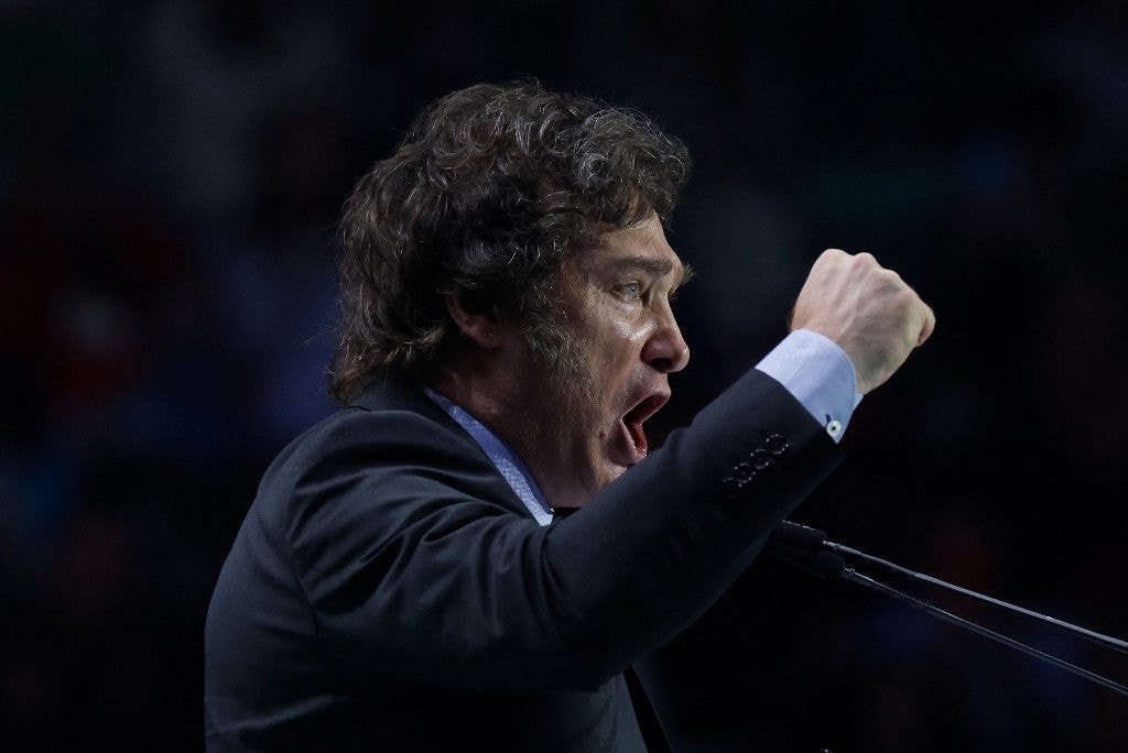 Argentina's president Javier Milei gestures on stage during the Spanish far-right wing party Vox's rally "Europa Viva 24" in Madrid on May 19, 2024. Argentina's president Javier Milei is scheduled to take part in the gathering of Spanish far-right party Vox alongside other hard-right leaders such as France's Marine Le Pen. (Photo by OSCAR DEL POZO / AFP)