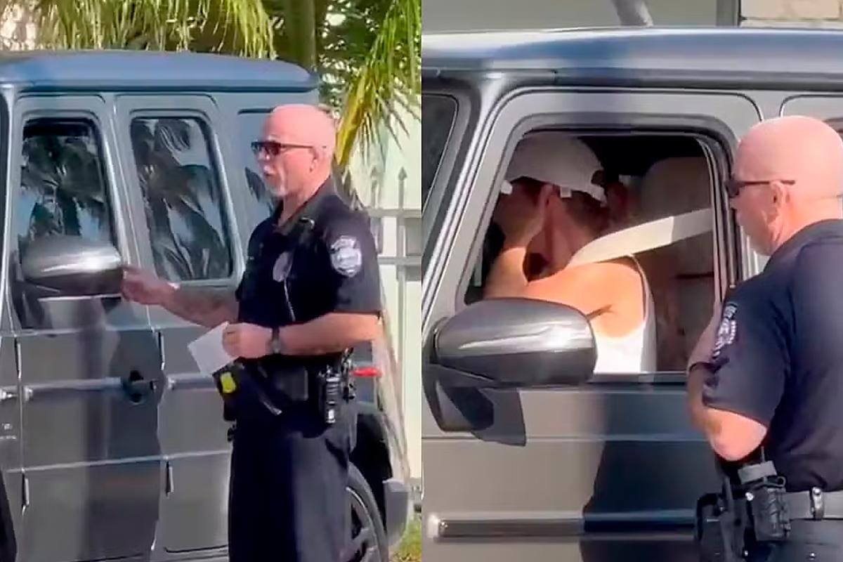 Gisele Bündchen sendo multada por um policial em Miami