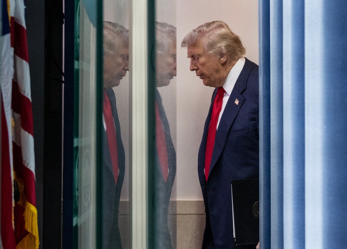 US President Donald Trump arrives for a news conference to discuss crime in Washington, DC, in the Brady Press Briefing Room at the White House in Washington, DC, on August 11, 2025. President Donald Trump announced Monday that he was deploying National Guard troops and putting the Washington police force under federal control to tackle crime in the US capital. "This is Liberation Day in DC, and we're going to take our capital back," Trump said at a White House press conference. (Photo by ANDREW CABALLERO-REYNOLDS / AFP)