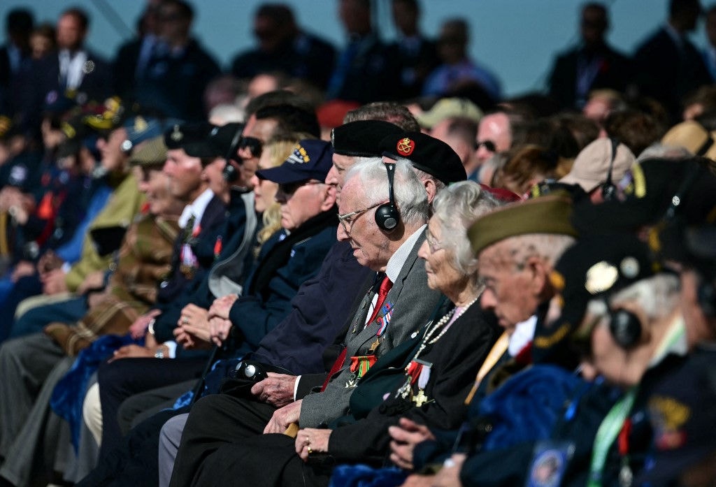 Veterans look on during the International commemorative ceremony at Omaha Beach marking the 80th anniversary of the World War II "D-Day" Allied landings in Normandy, in Saint-Laurent-sur-Mer, in northwestern France, on June 6, 2024. The D-Day ceremonies on June 6 this year mark the 80th anniversary since the launch of 'Operation Overlord', a vast military operation by Allied forces in Normandy, which turned the tide of World War II, eventually leading to the liberation of occupied France and the end of the war against Nazi Germany. (Photo by MIGUEL MEDINA / AFP)