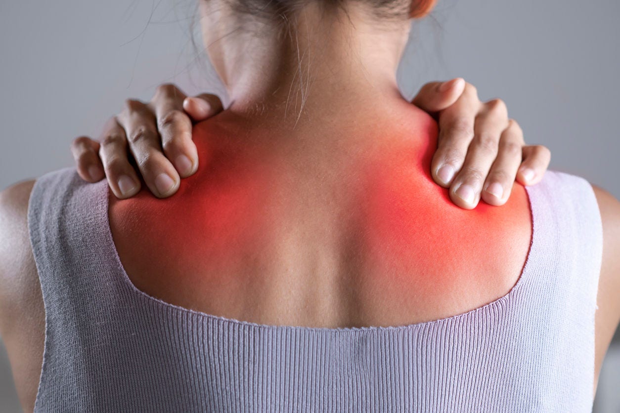 Asian woman has shoulder pain. Female holding painful shoulder with another hands. People with body-muscles problem, Healthcare And Medicine.