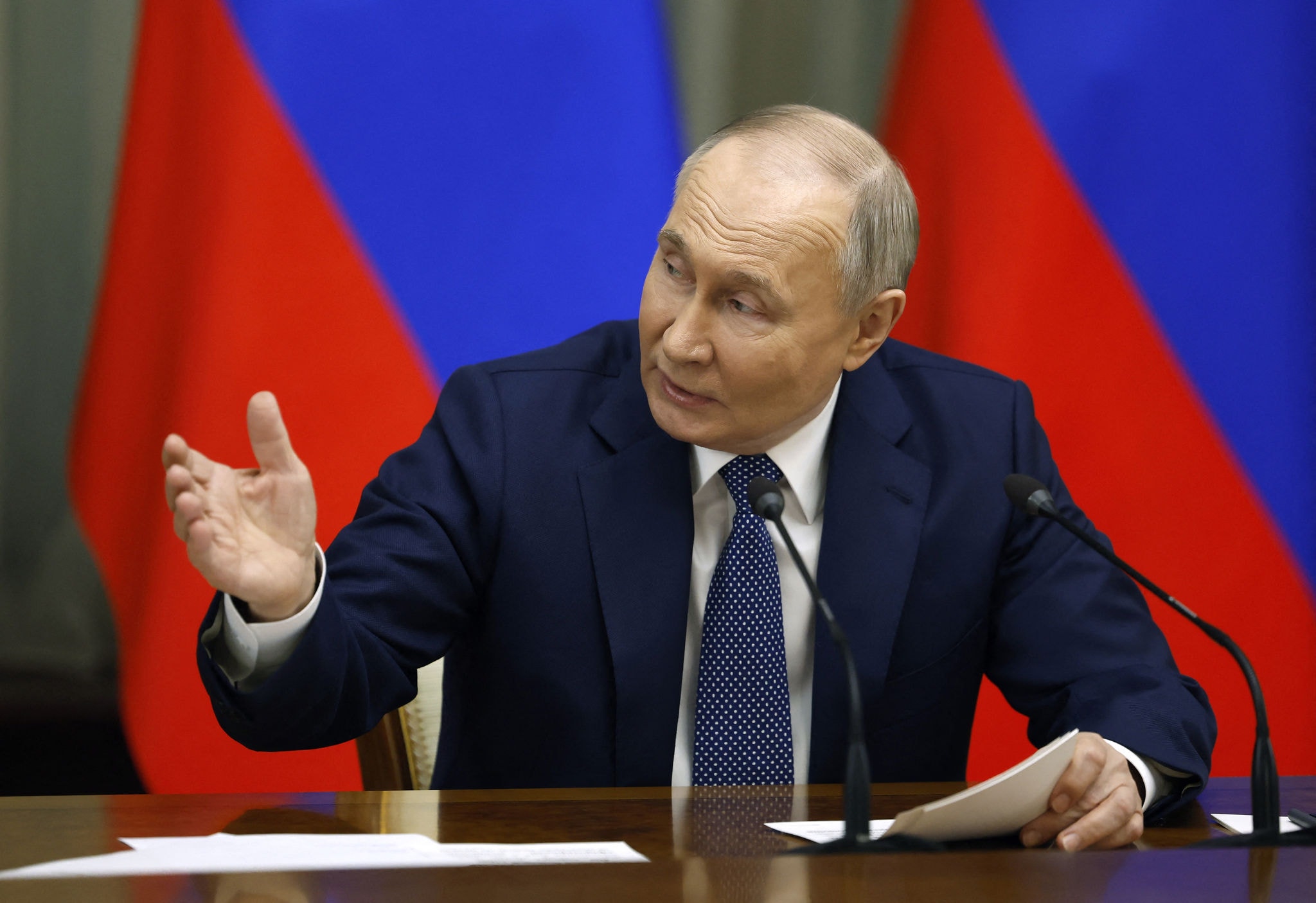 In this pool photograph distributed by Russian state owned Sputnik agency President Vladimir Putin holding a meeting with the Russian government members in Moscow on May 6, 2024. (Photo by Dmitry ASTAKHOV / POOL / AFP)