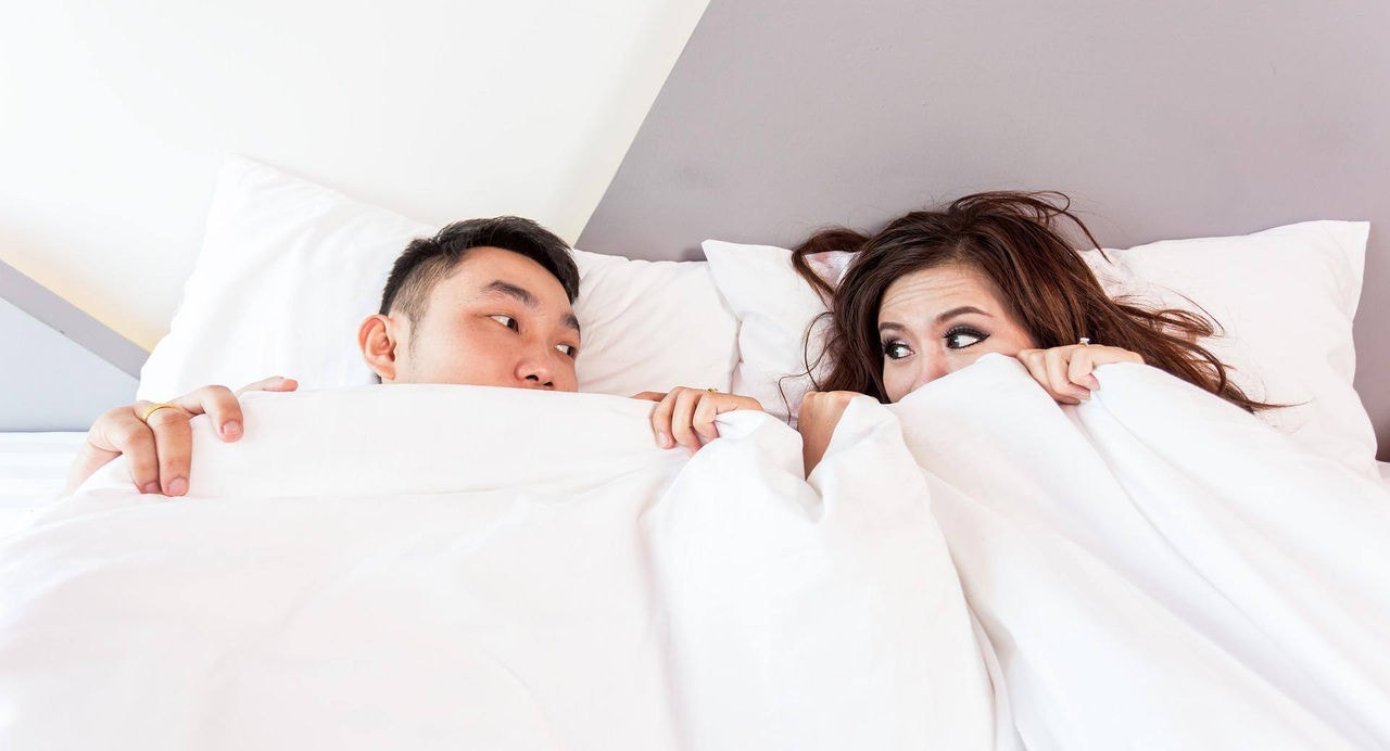 Casal na cama