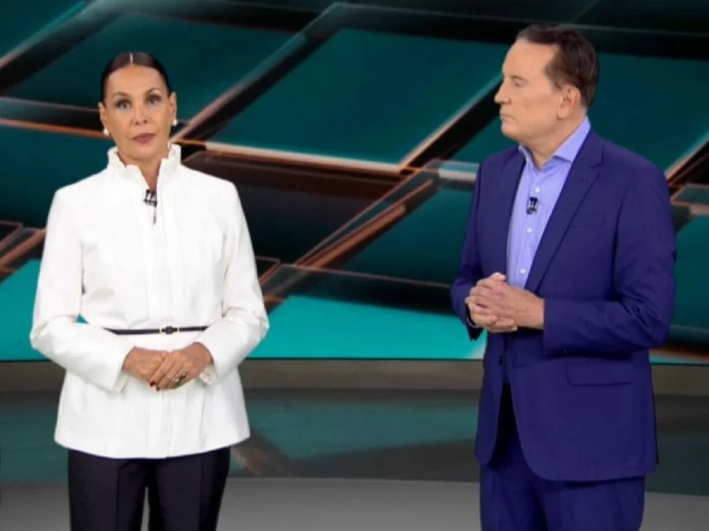 Carolina Ferraz e Roberto Cabrini no Domingo Espetacular