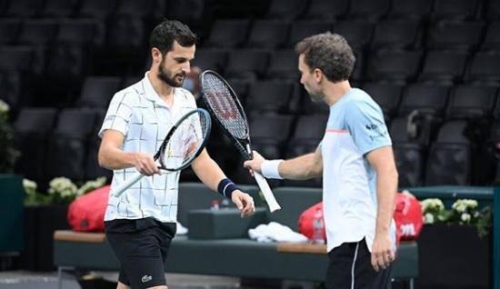 Bruno Soares com o parceiro de dupla Mate Pavic