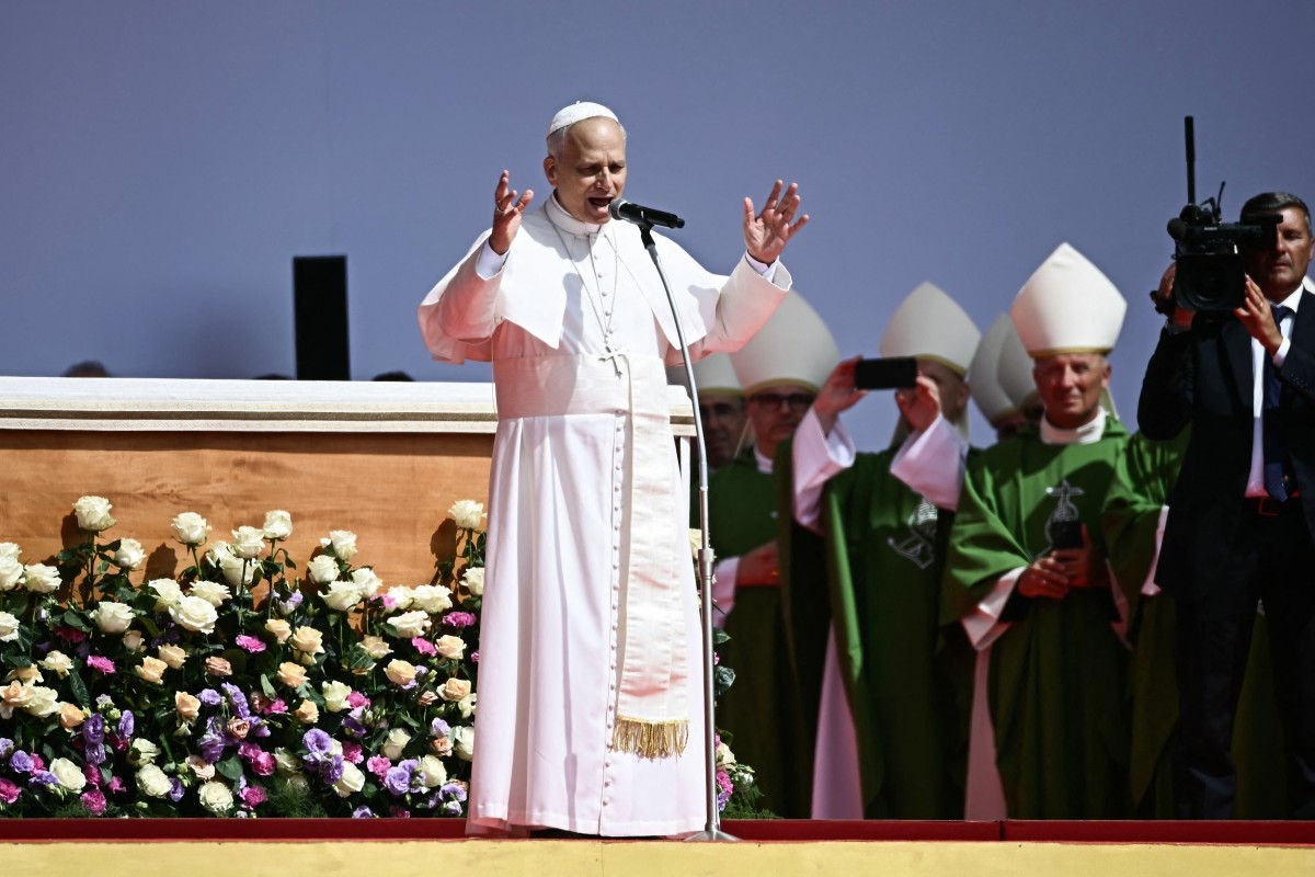 Pope Leo XIV leads a mass in the Tor Vergata district of Rome, as part of Jubilee of Youth, on August 3, 2025. Pope Leo XIV presided over a final mass in Rome for over one million young people, the culmination of a youth pilgrimage that has drawn Catholics from across the world. (Photo by Filippo MONTEFORTE / AFP)