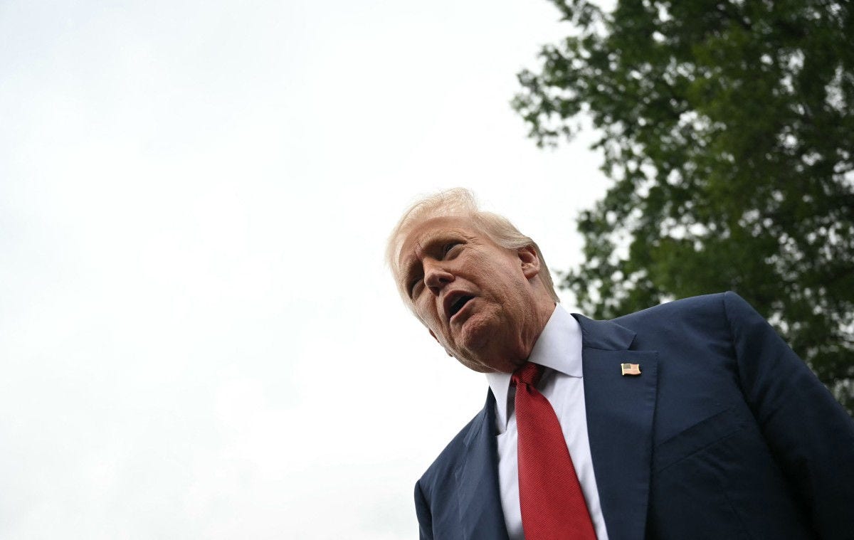 US President Donald Trump speaks to the press before boarding Marine One on the South Lawn of the White House in Washington, DC, on August 1, 2025. Trump is travelling to New Jersey to spend the weekend at his Bedminster residence. (Photo by Jim WATSON / AFP)