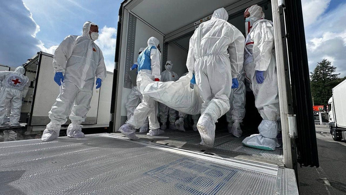 Procedimento de troca de corpos em um local não divulgado na fronteira entre Bielorrússia e Ucrânia