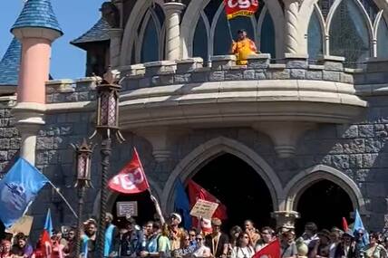 Disney employees in Paris take to the castle in protest of a salary increase